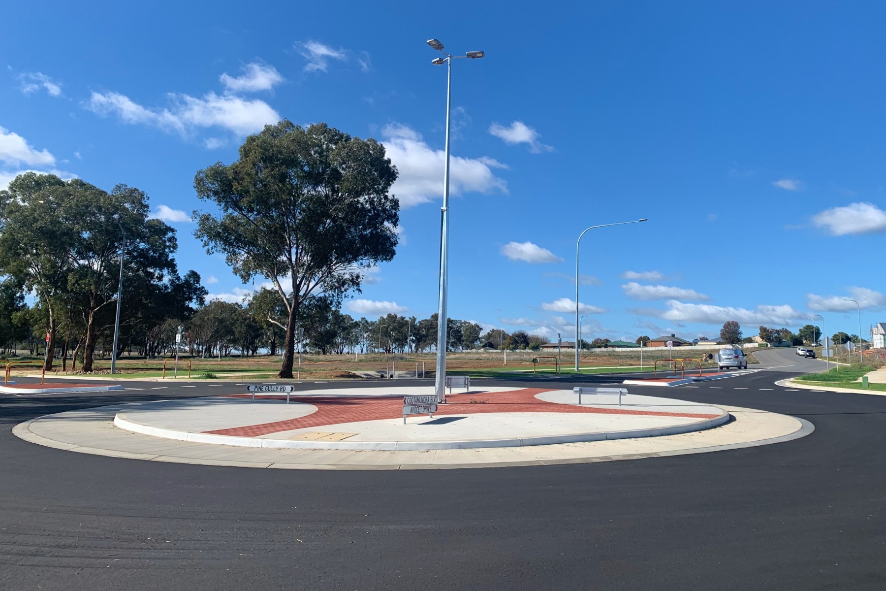 Newly constructed roundabout in a suburban area.