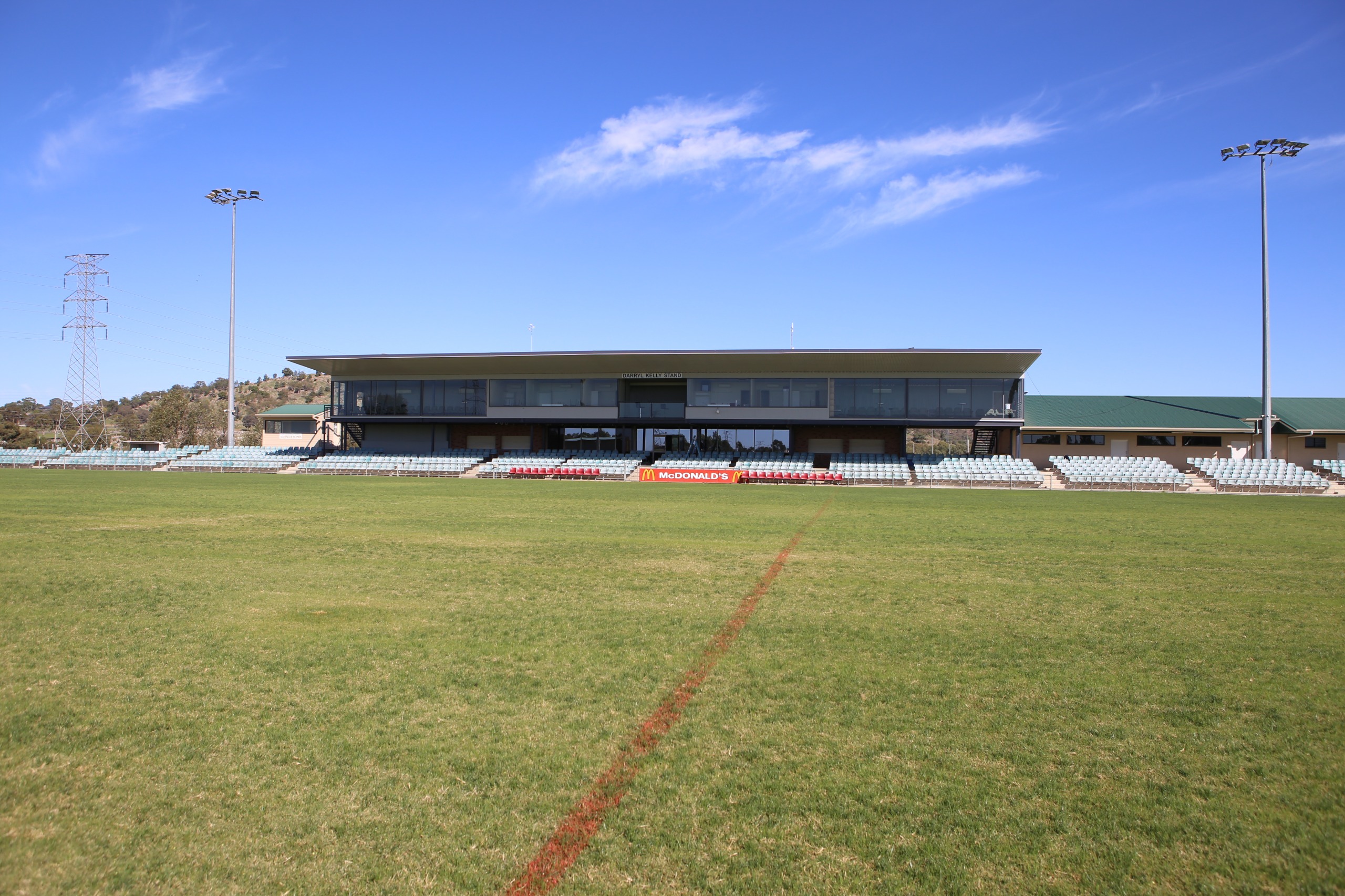 View of a grandstand overlooking a rugby league field.
