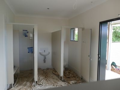 View or showers and toilets in newly constructed change room.